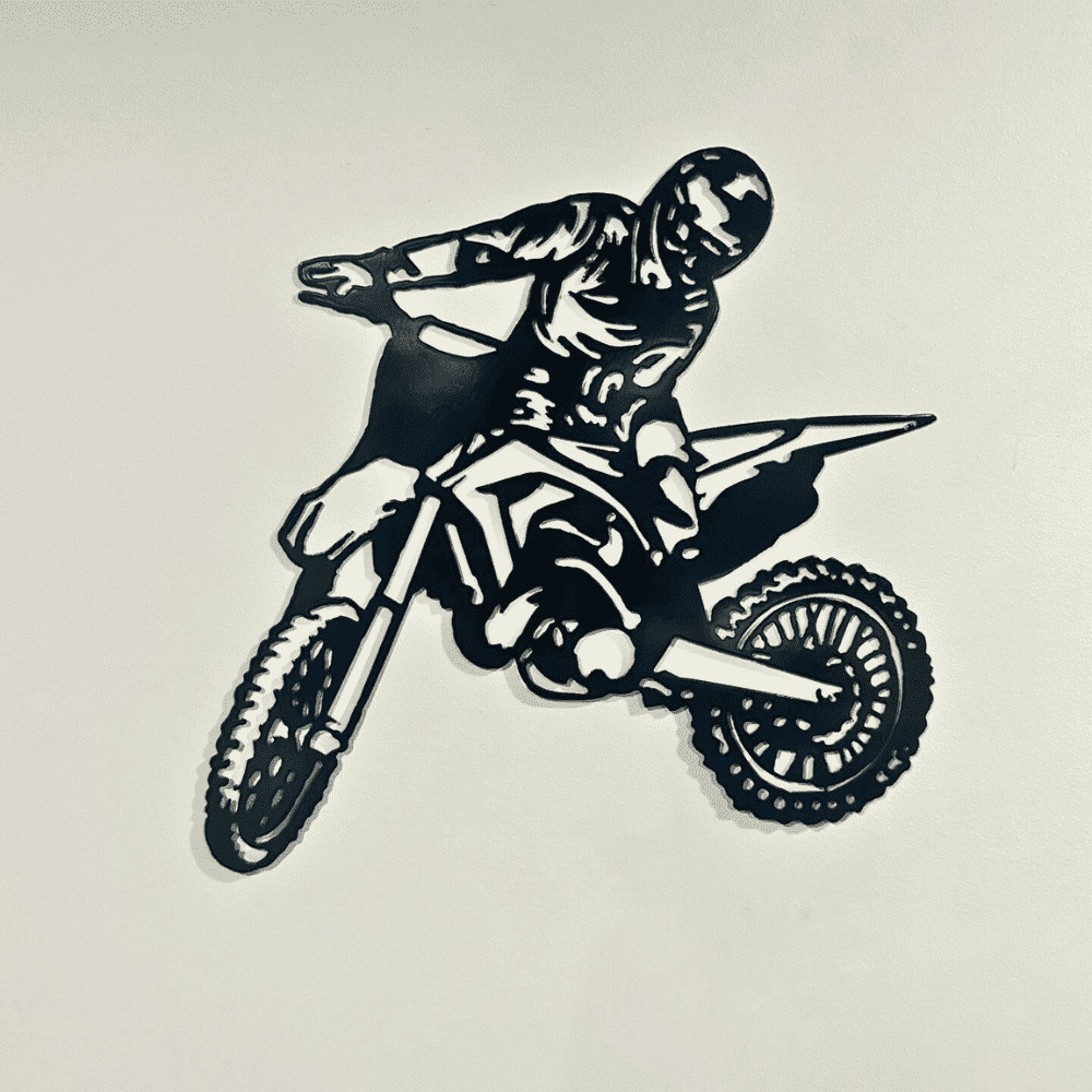 Black Metal Art Piece Depicting Dirt Bike